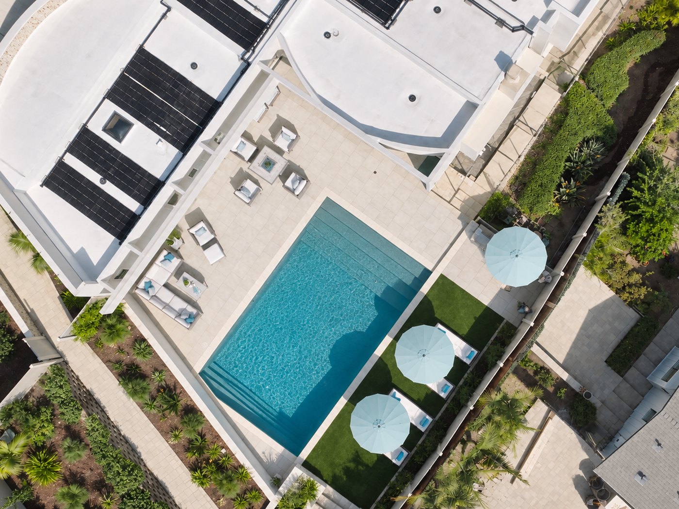 Solar heating panels on a roof above a pool