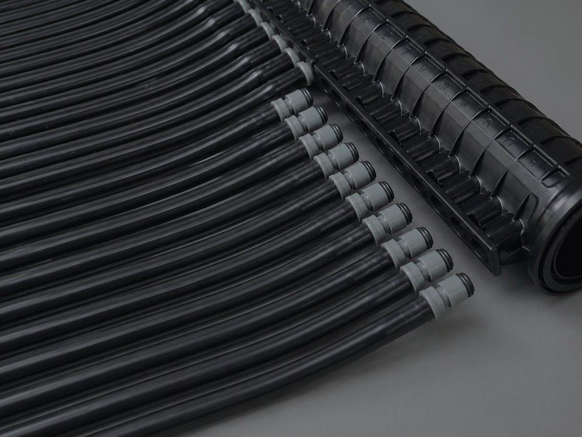 A NanoEdge header with barbed fittings and ring clamps