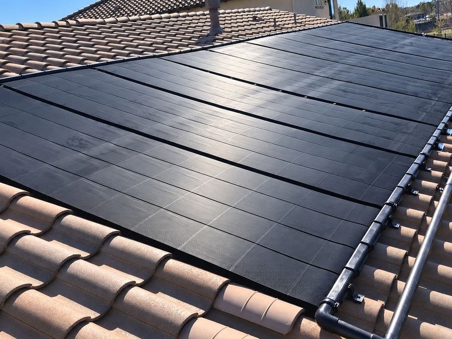 SwimJoy panels installed on a tile roof