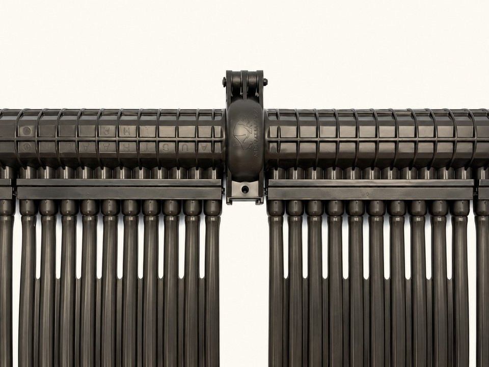 Two NanoEdge panel headers joined by a hinged clamp, with narrow tubes running down from each