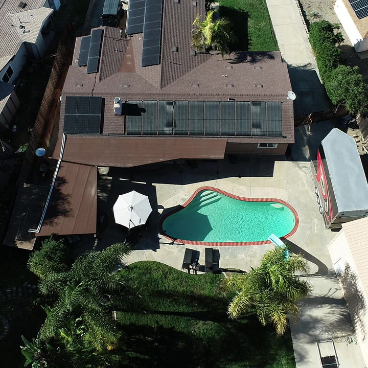 SwimEasy High-Performance Solar Pool Heater Panel Replacement - Highest Performing Design - 15-20 Year Life Expectancy (Includes 4 Heavy-Duty Rubber Hose Connectors)