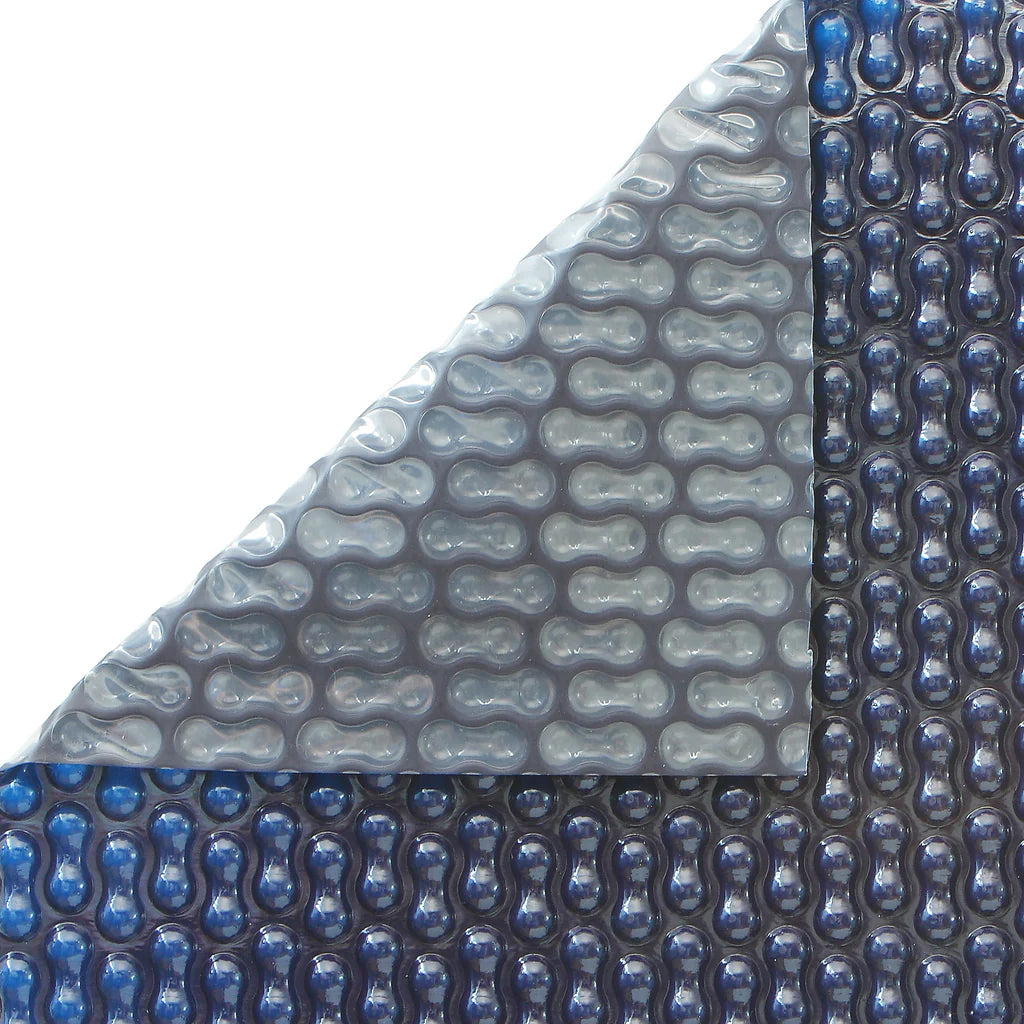 GeoBubble EnergyGuard™ solar pool cover, corner folded to show both sides of the bubble material