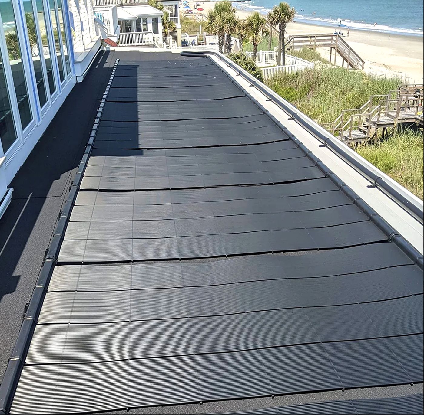 SwimJoy panels installed on an oceanfront roof